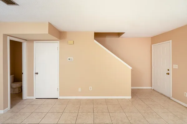 a view of a hallway with closet