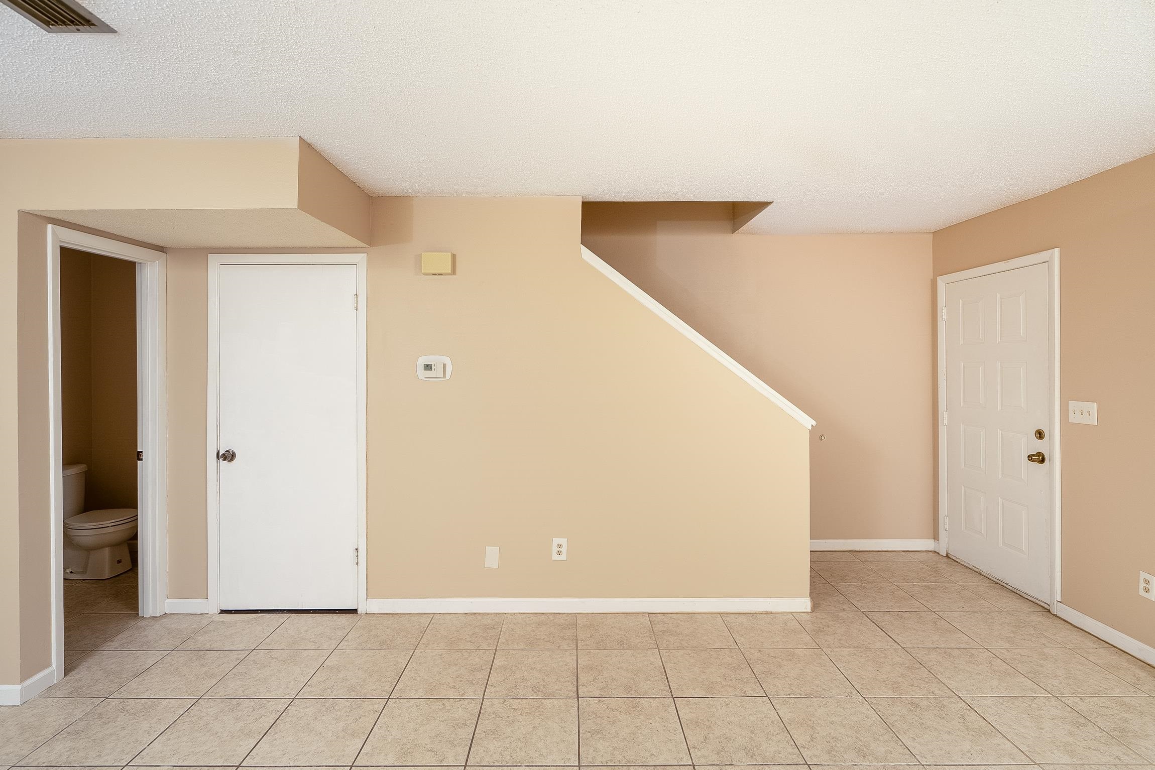 123 Rio Del Mar Street, Unit B St. Augustine, FL 32080 - Photo 17 of 51 a view of a hallway with closet
