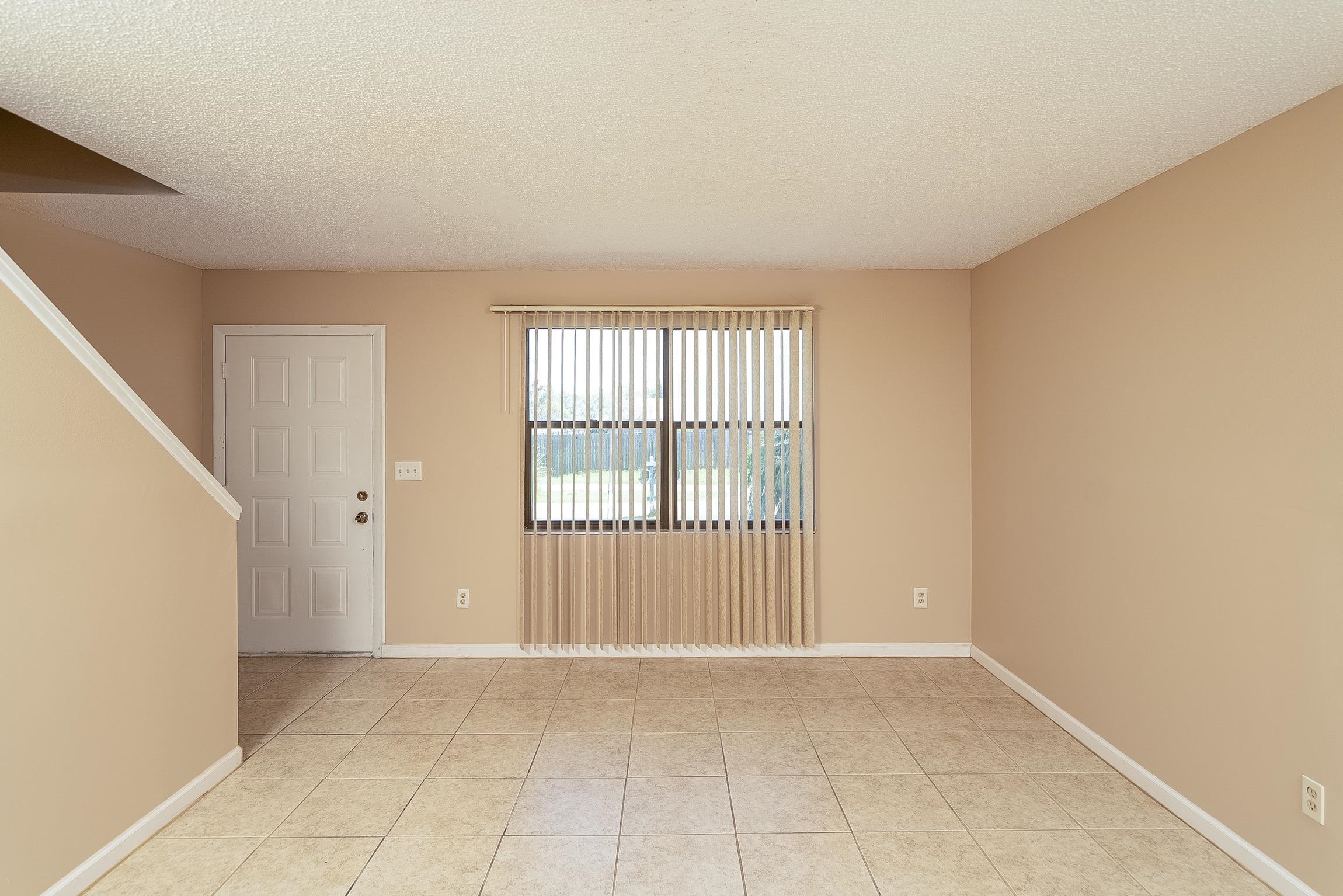 123 Rio Del Mar Street, Unit B St. Augustine, FL 32080 - Photo 19 of 51 a view of an empty room with a window