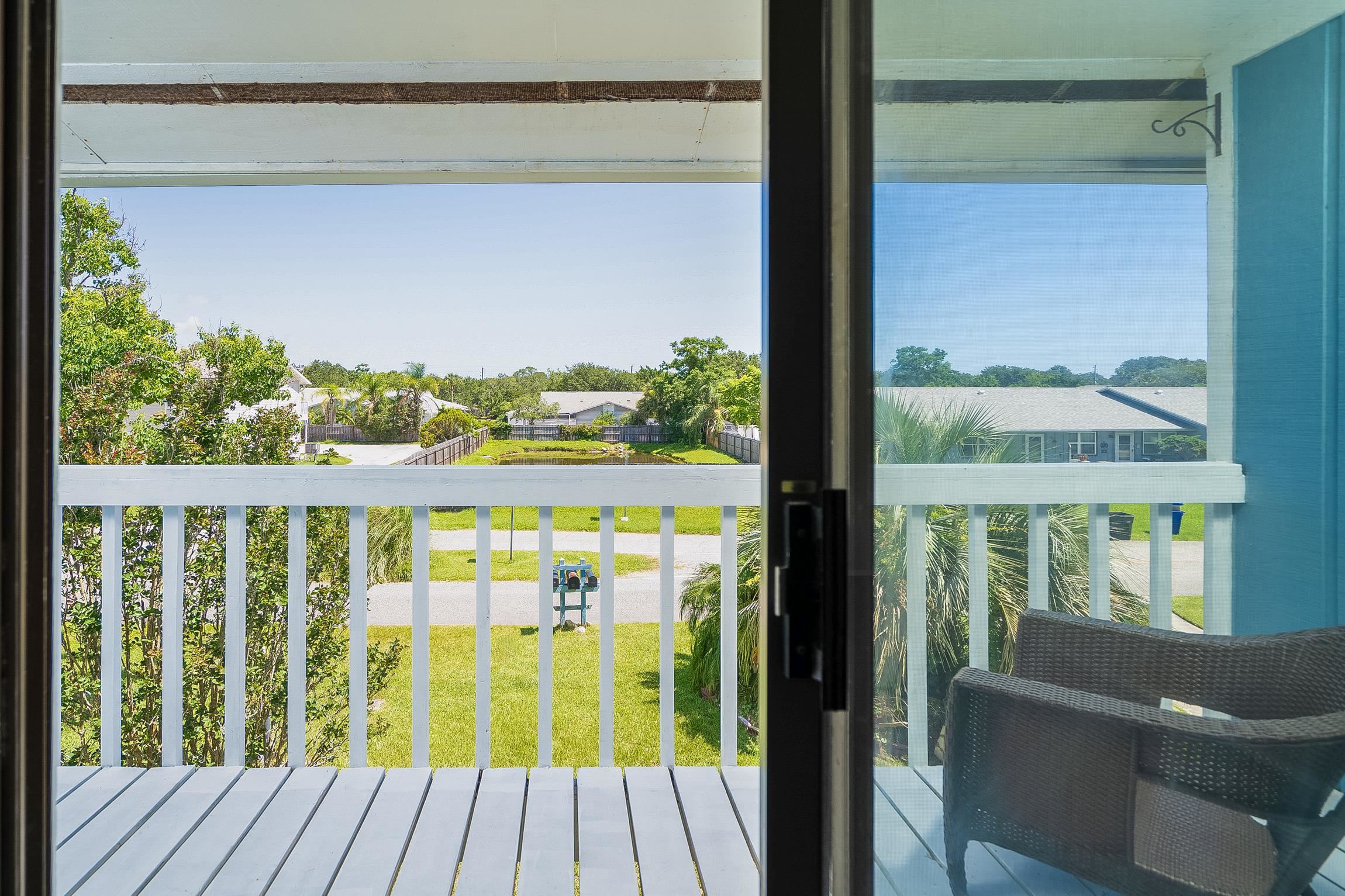 123 Rio Del Mar Street, Unit B St. Augustine, FL 32080 - Photo 33 of 51 a view of a balcony with chair