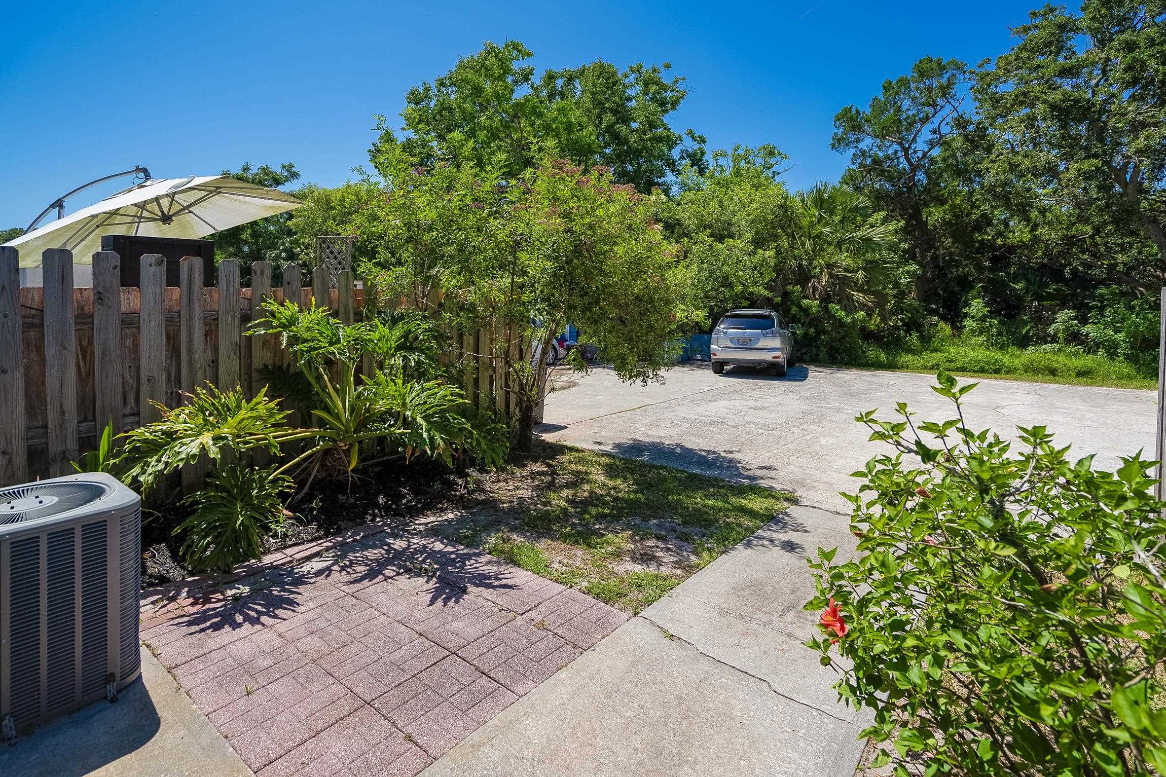 123 Rio Del Mar Street, Unit B St. Augustine, FL 32080 - Photo 40 of 51 a garden view with a seating space