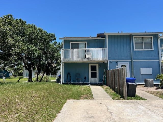 123 Rio Del Mar Street, Unit B St. Augustine, FL 32080 - Photo 6 of 51 a front view of a house with a yard