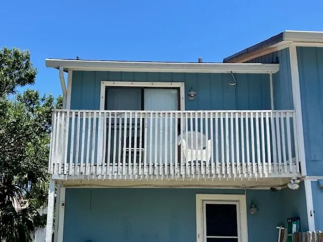 a view of a house with a balcony