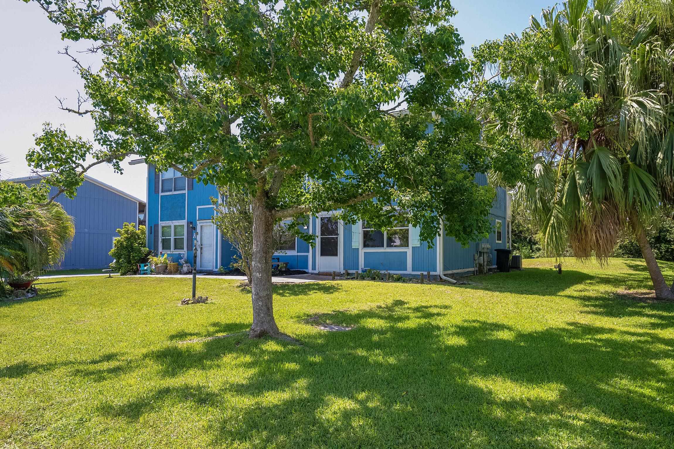 123 Rio Del Mar Street, Unit B St. Augustine, FL 32080 - Photo 9 of 51 a view of a house with swimming pool and sitting area