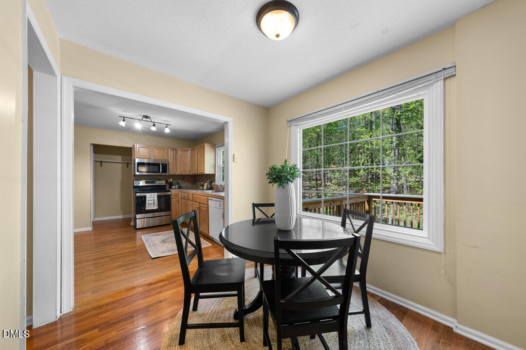 122 Stedwick Place Durham, NC 27712 - Photo 11 of 39 a dining room with furniture and window