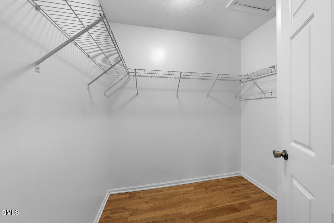 122 Stedwick Place Durham, NC 27712 - Photo 27 of 39 a view of a room with racks on the wall