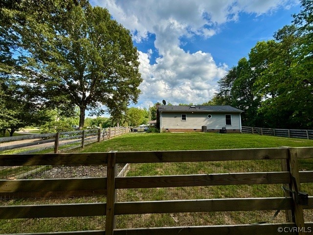 1217 Windyknight Road Montpelier, VA 23192 - Photo 3 of 11 a view of a house with a big yard