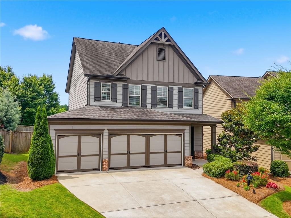 147 Fieldbrook Crossing Canton, GA 30115 - Photo 36 of 46 a front view of a house with a garden