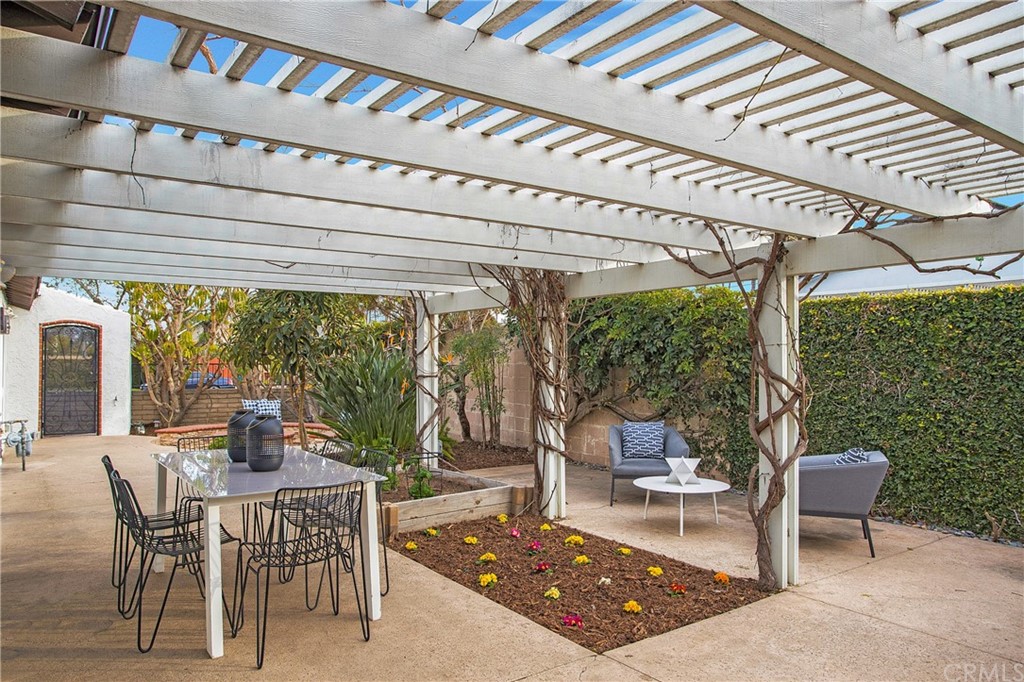 1661 Texas Circle Costa Mesa, CA 92626 - Photo 20 of 36 Shady pergola with an area to farm