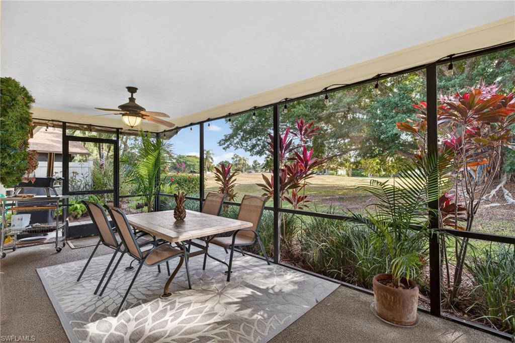 314 Reynolds Court Naples, FL 34112 - Photo 21 of 30 a view of a dining room with furniture window and outside view