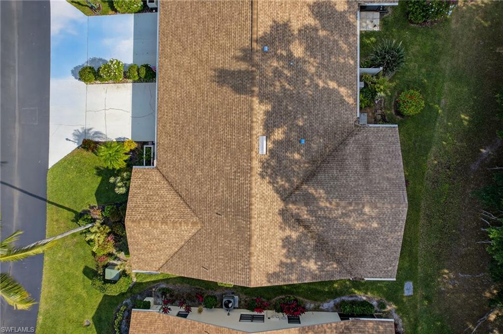 314 Reynolds Court Naples, FL 34112 - Photo 27 of 30 an aerial view of a residential houses with yard
