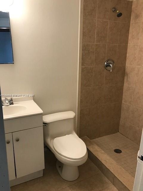 Sun-Tan Village Hialeah, FL 33010 - Photo 9 of 13 a bathroom with a sink a toilet and shower