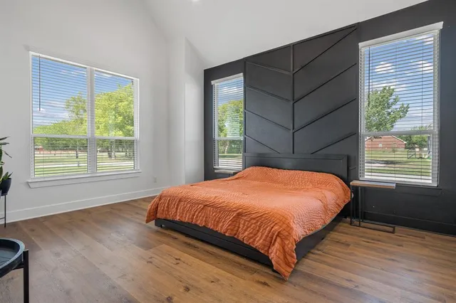 a room with a table chairs and entryway