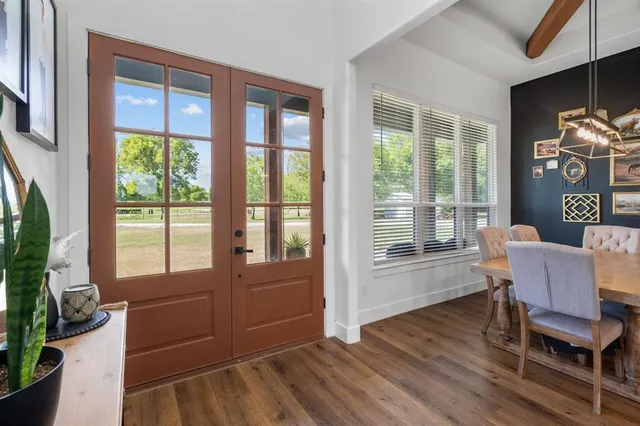 a living room with furniture and a gate
