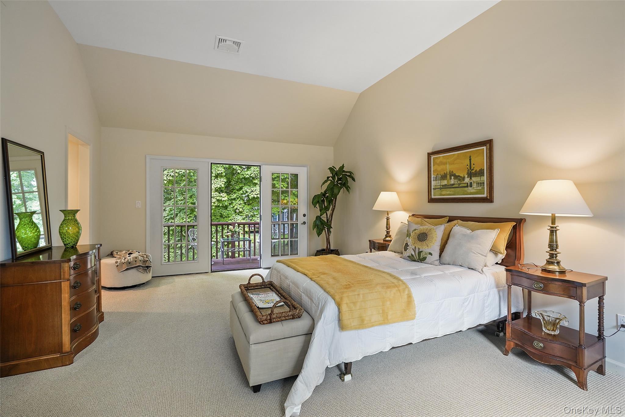 18 Cross River Road Mount Kisco, NY 10549 - Photo 16 of 30 a bedroom with a bed and a couch