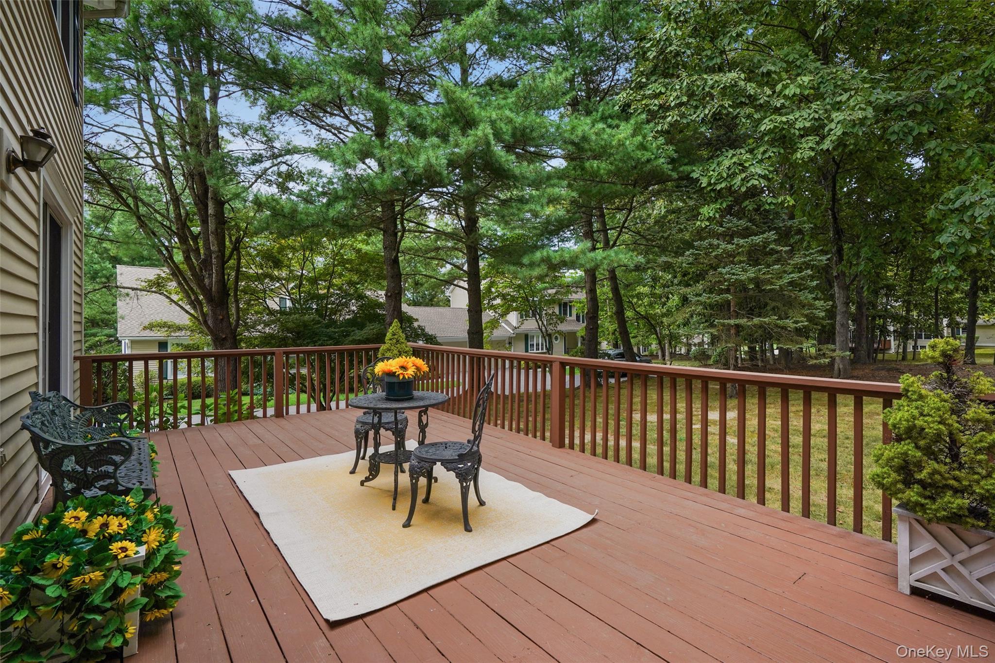 18 Cross River Road Mount Kisco, NY 10549 - Photo 22 of 30 a view of balcony with wooden floor and outdoor seating