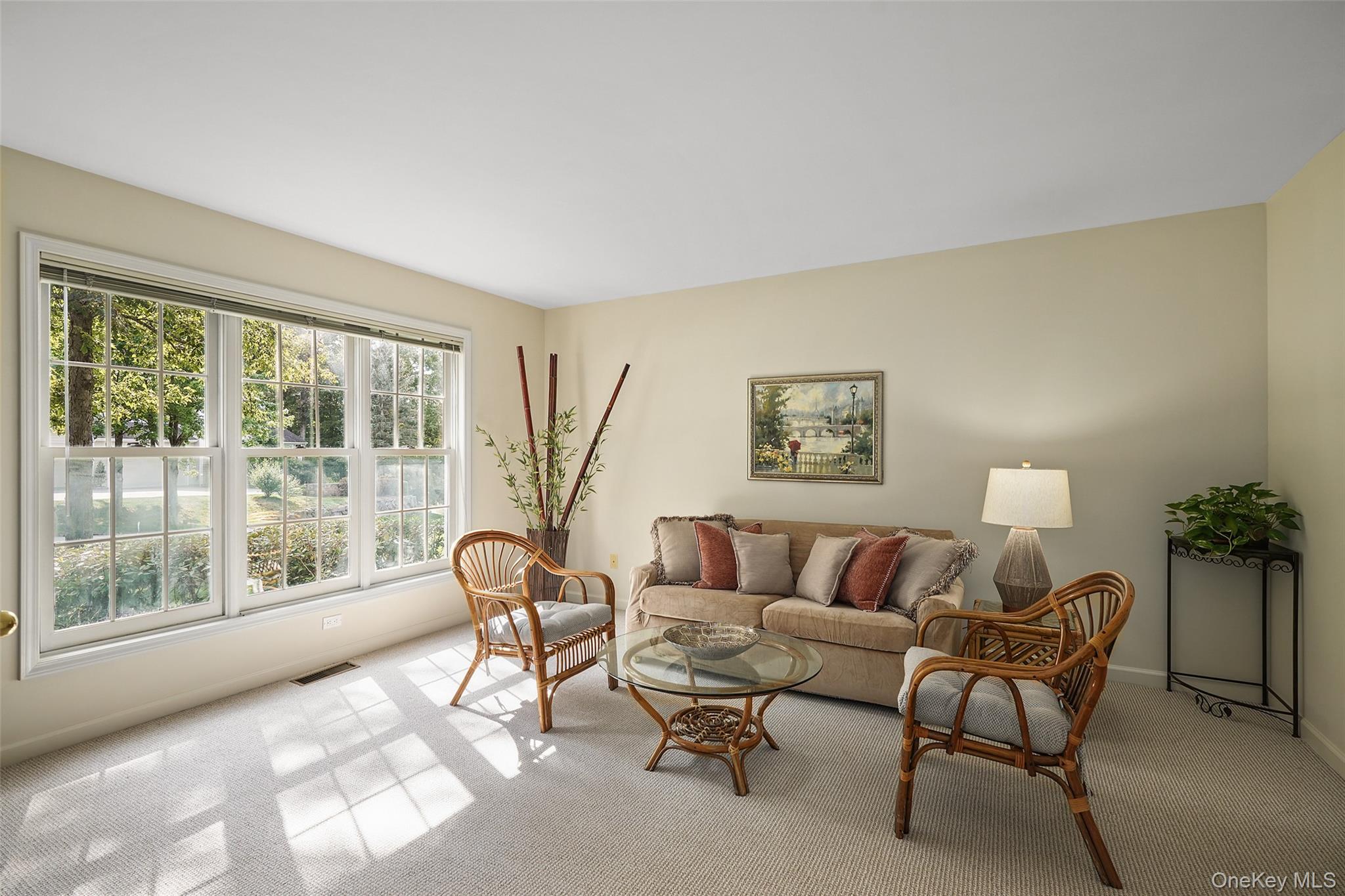 18 Cross River Road Mount Kisco, NY 10549 - Photo 3 of 30 a living room with furniture and a large window