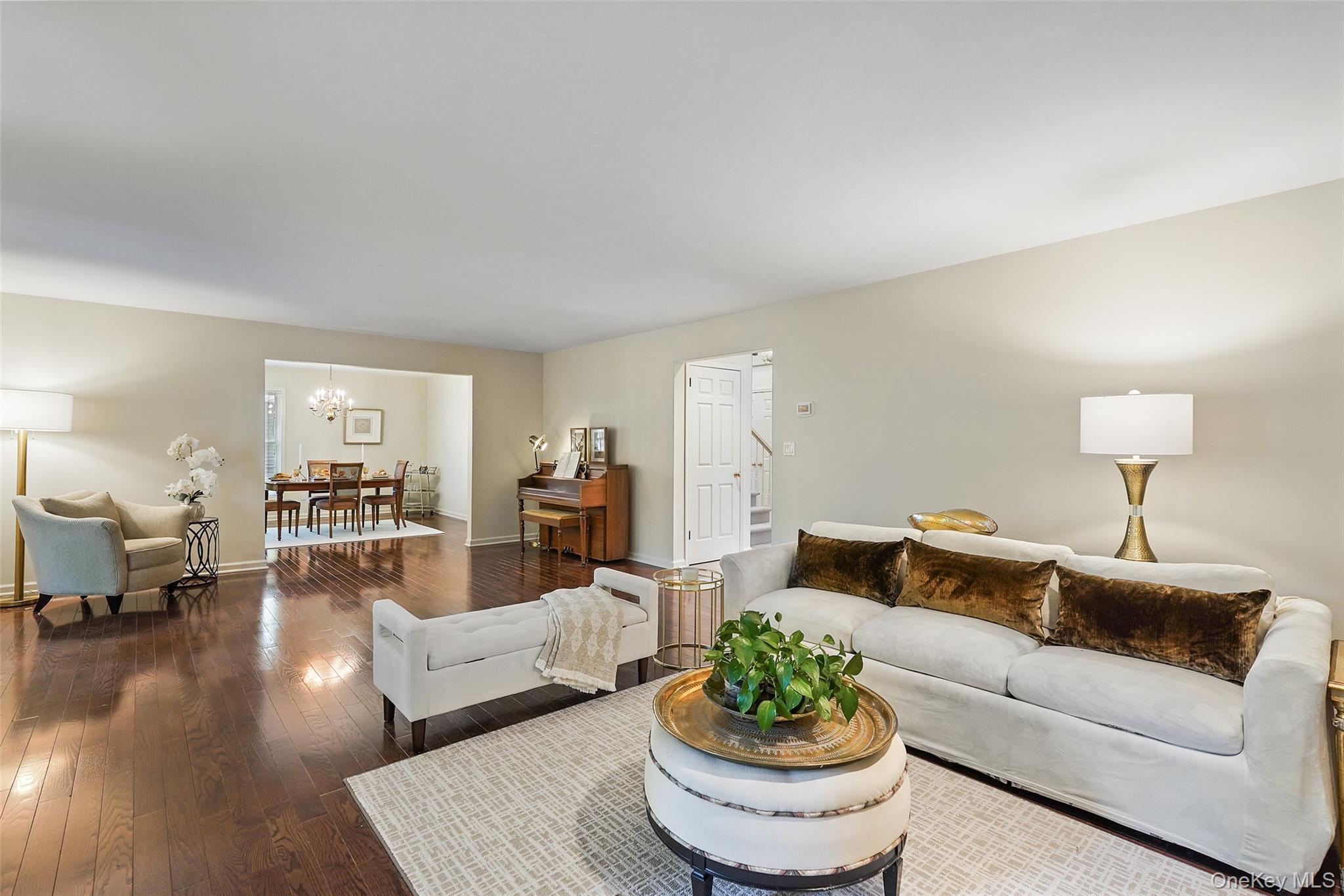 18 Cross River Road Mount Kisco, NY 10549 - Photo 8 of 30 a living room with furniture and a table