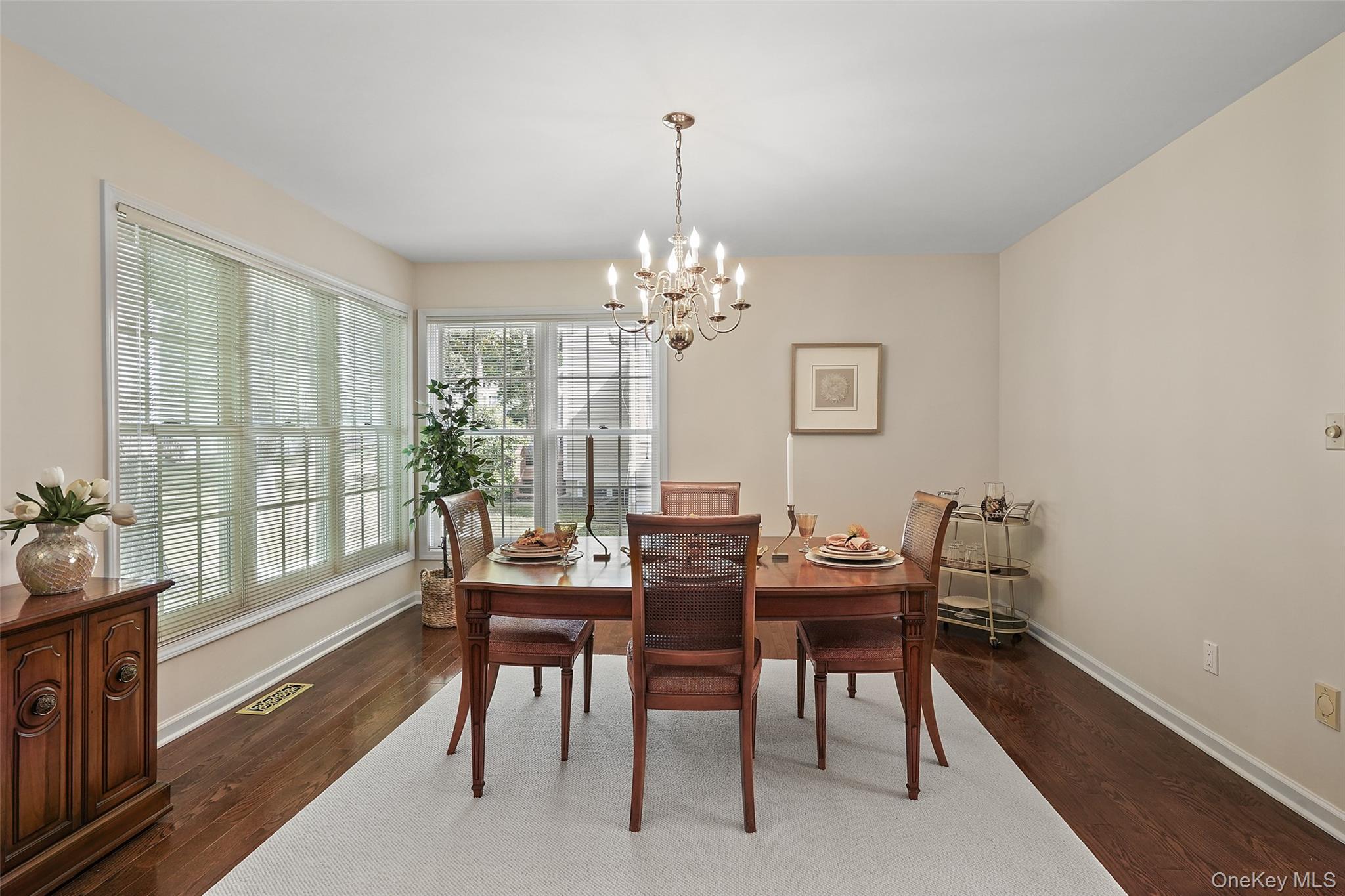 18 Cross River Road Mount Kisco, NY 10549 - Photo 9 of 30 a view of a dining room with furniture window and outside view