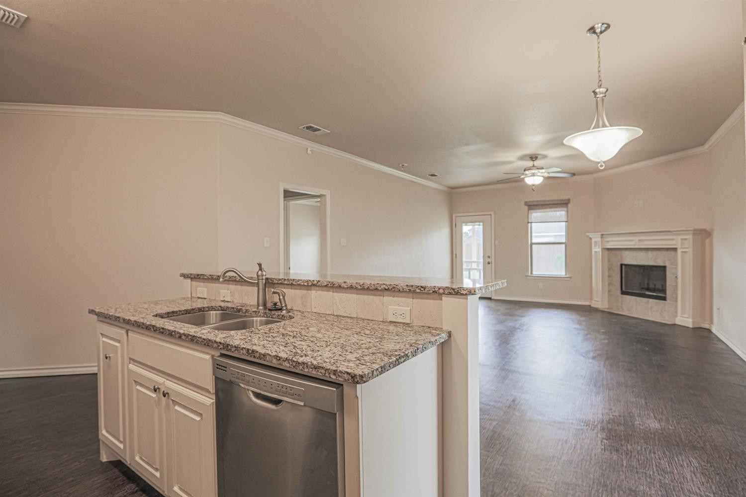 5019 Jarvis Street Lubbock, TX 79416 - Photo 12 of 31 a bathroom with a granite countertop sink and a mirror