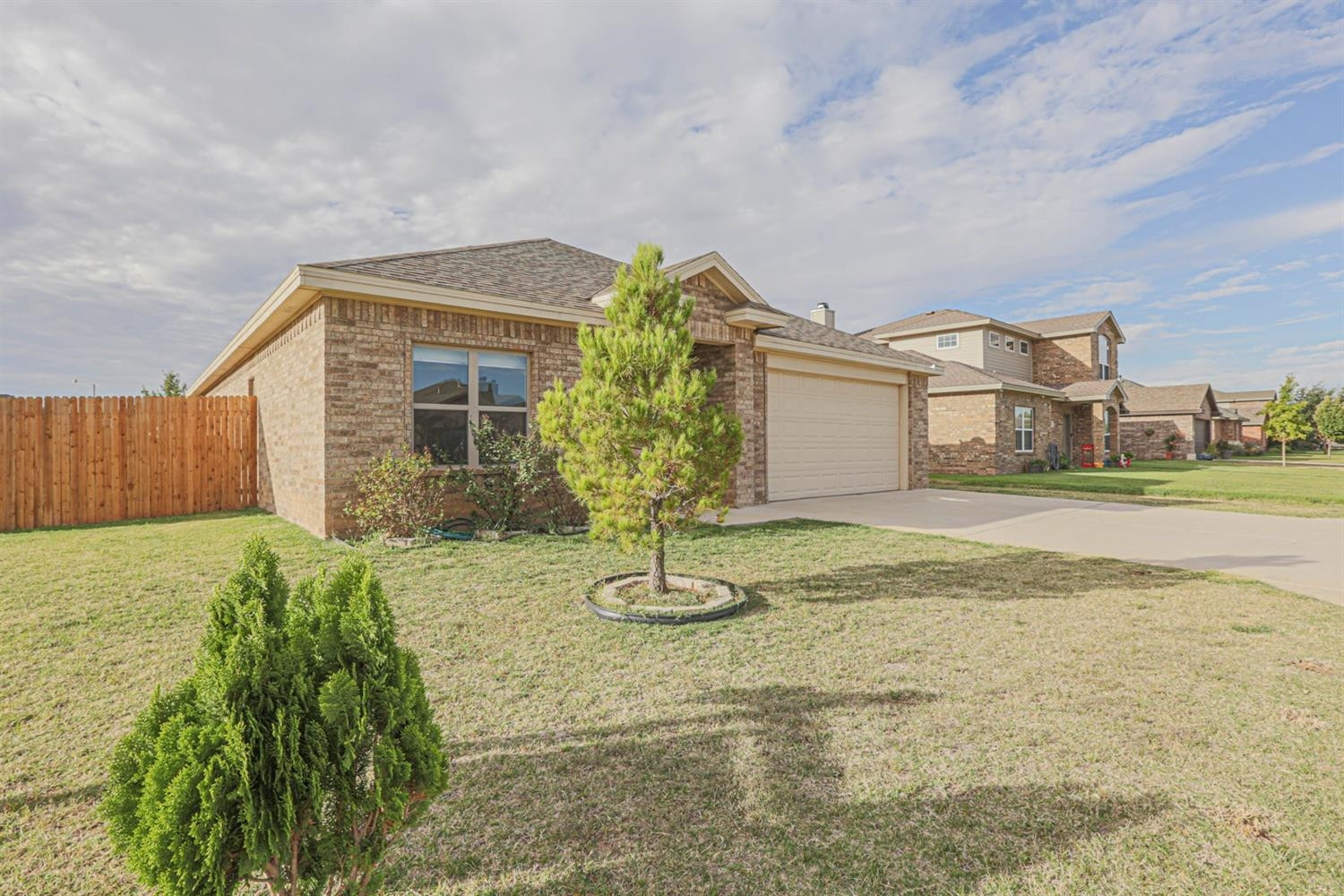 5019 Jarvis Street Lubbock, TX 79416 - Photo 2 of 31 a house view with a garden space