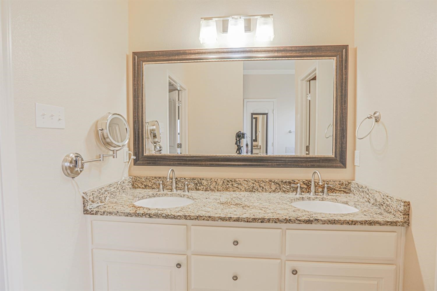 5019 Jarvis Street Lubbock, TX 79416 - Photo 24 of 31 a bathroom with sink and mirror