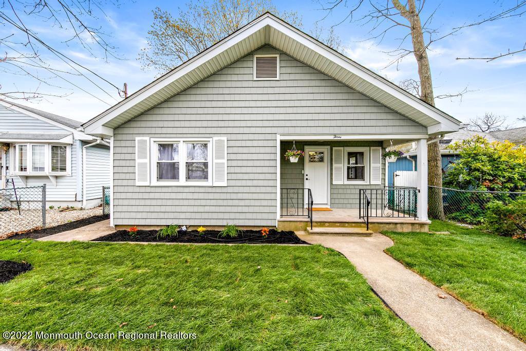 3 George Road Toms River, NJ 08753 - Photo 1 of 24 a front view of a house with a yard
