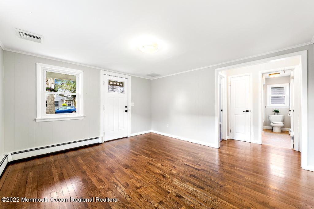 3 George Road Toms River, NJ 08753 - Photo 5 of 24 a view of livingroom with hardwood floor and window