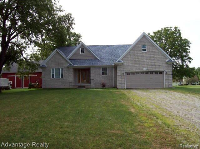 56299 Fairchild Road Macomb, MI 48042 - Photo 10 of 14 front
