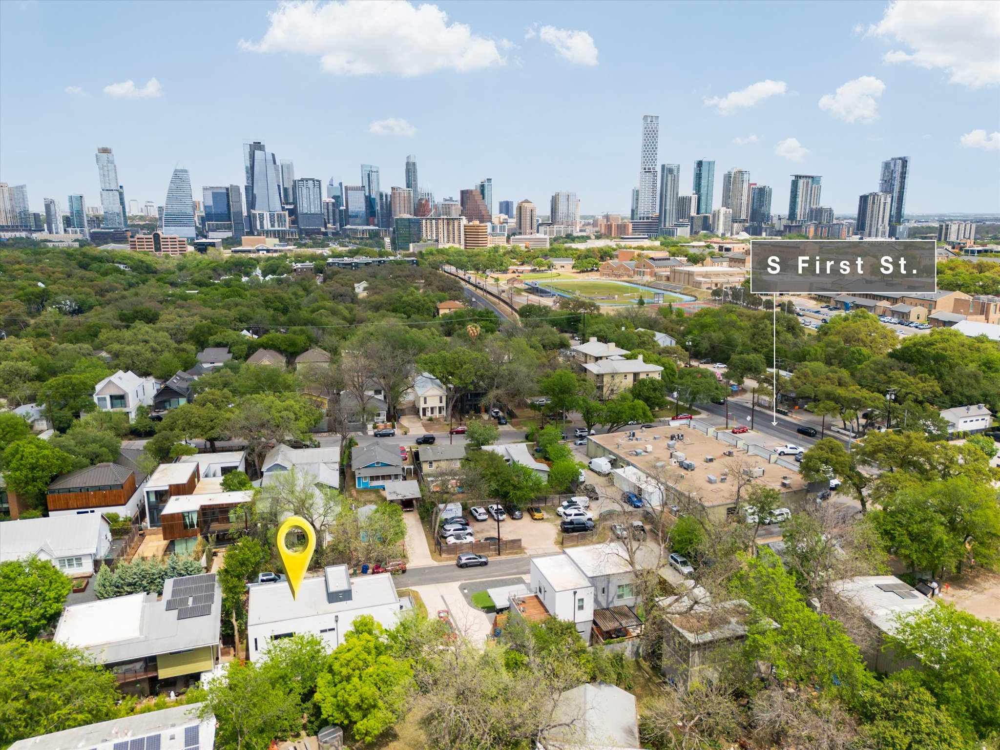 615 Jewell Street Austin, TX 78704 - Photo 23 of 25 From here, you’re steps to the cafés and buzz of South First and South Congress, and minutes by foot or bike to Auditorium Shores, the Hike-and-Bike Trail, Barton Springs & Zilker Park, and Downtown.
