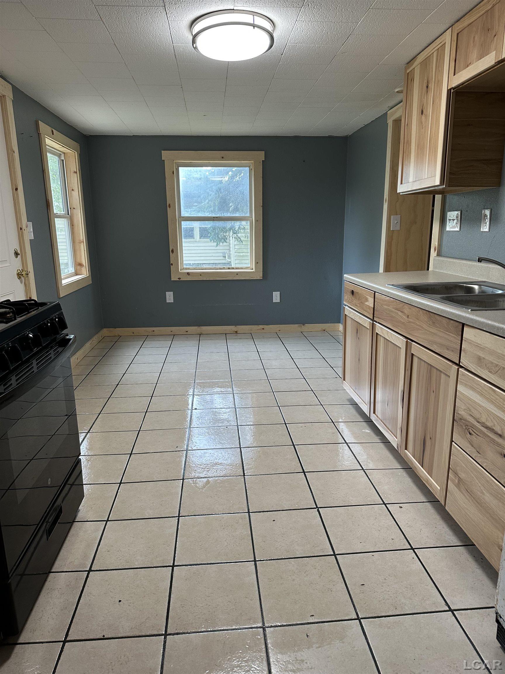4488 Hudson Road Osseo, MI 49266 - Photo 4 of 10 50183341-9edd28e5-919e-4d33-9751-395cd89bfc9c.JPG