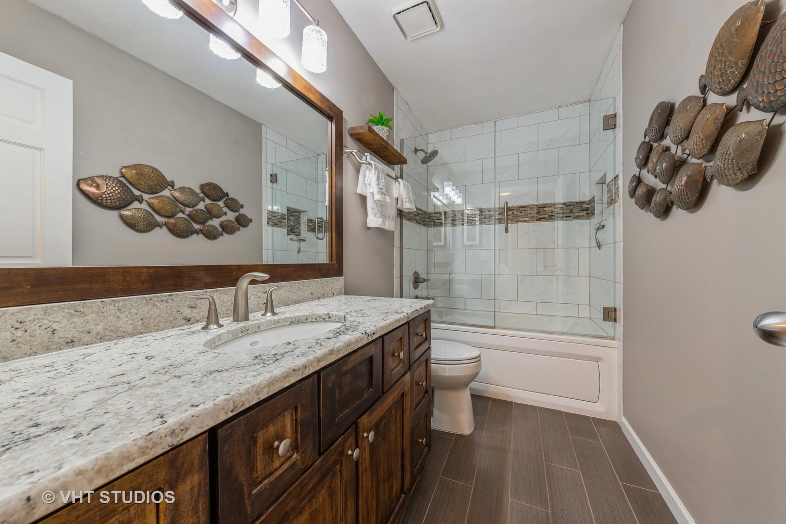 53 Wedgewood Road Matteson, IL 60443 - Photo 14 of 27 a bathroom with a granite countertop sink a toilet and shower