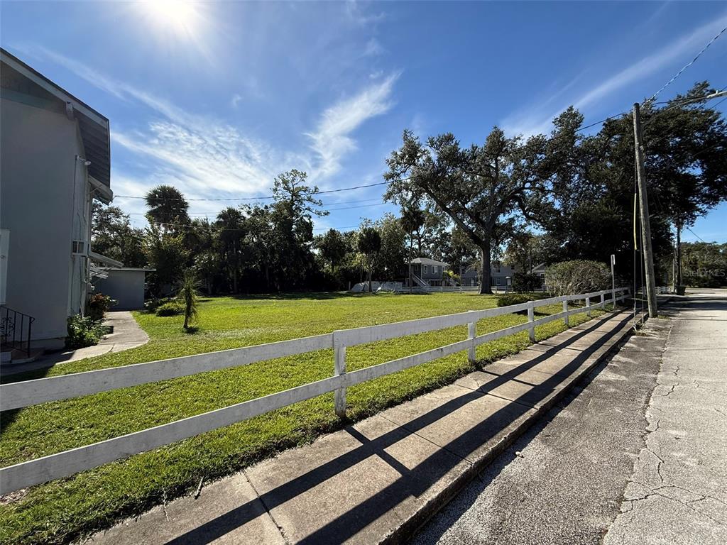 1101 South Ridgewood Avenue Daytona Beach, FL 32114 - Photo 30 of 37 a view of a yard with a park