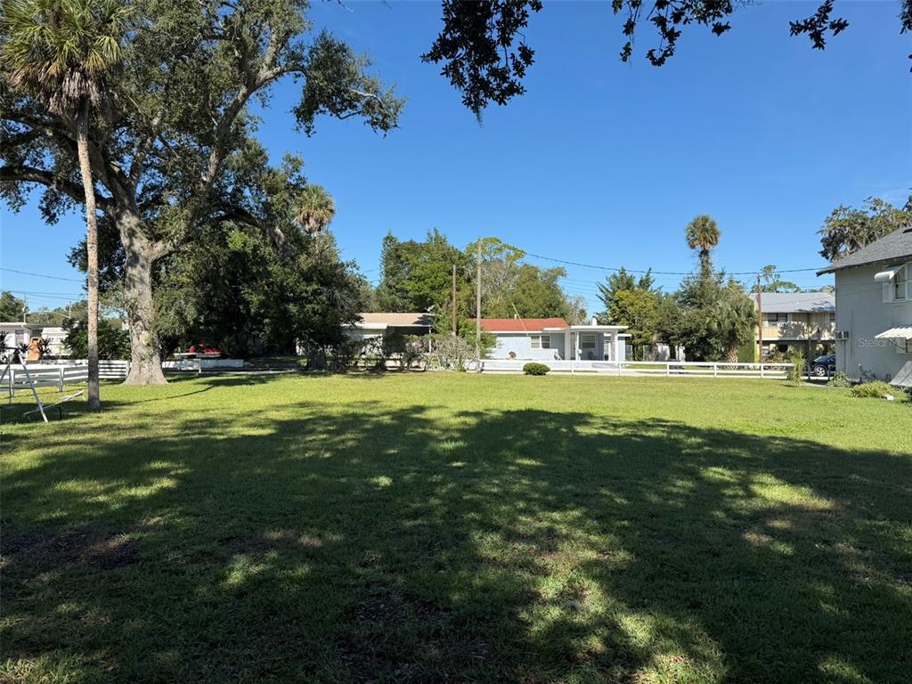 1101 South Ridgewood Avenue Daytona Beach, FL 32114 - Photo 36 of 37 a view of a park with large trees