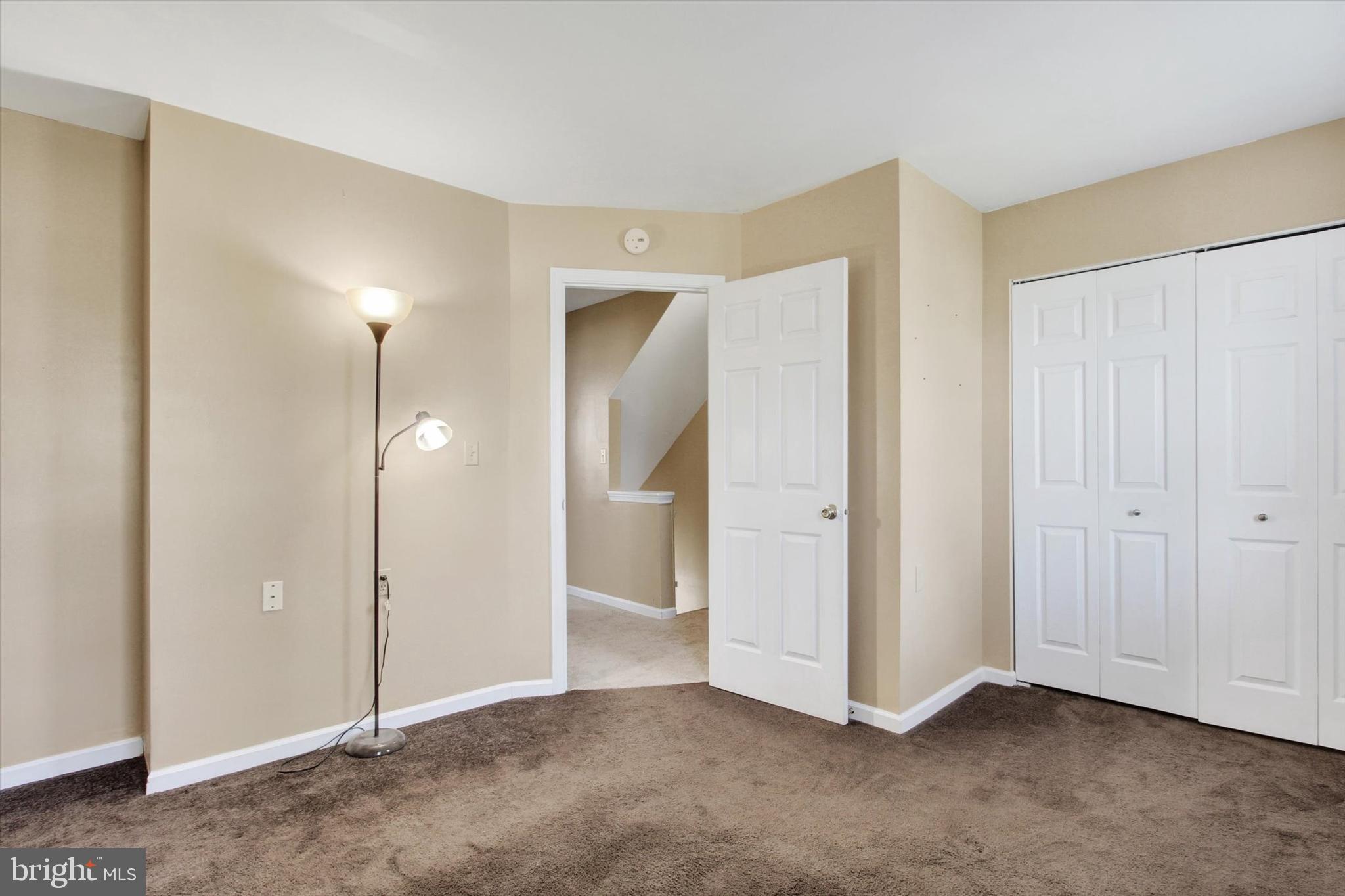 117 Orchard Lane, Unit 12 Hanover, PA 17331 - Photo 12 of 23 a view of an empty room with closet area