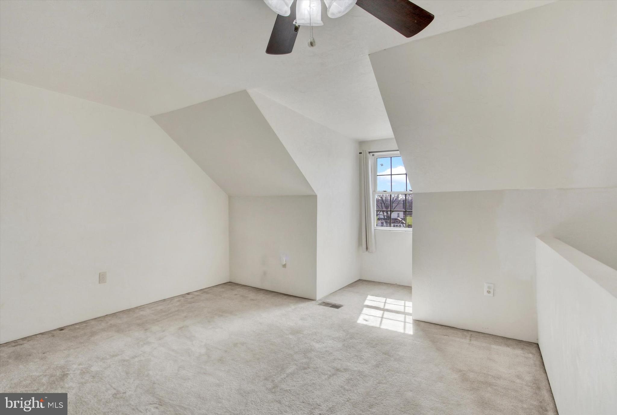 117 Orchard Lane, Unit 12 Hanover, PA 17331 - Photo 16 of 23 an empty room with windows