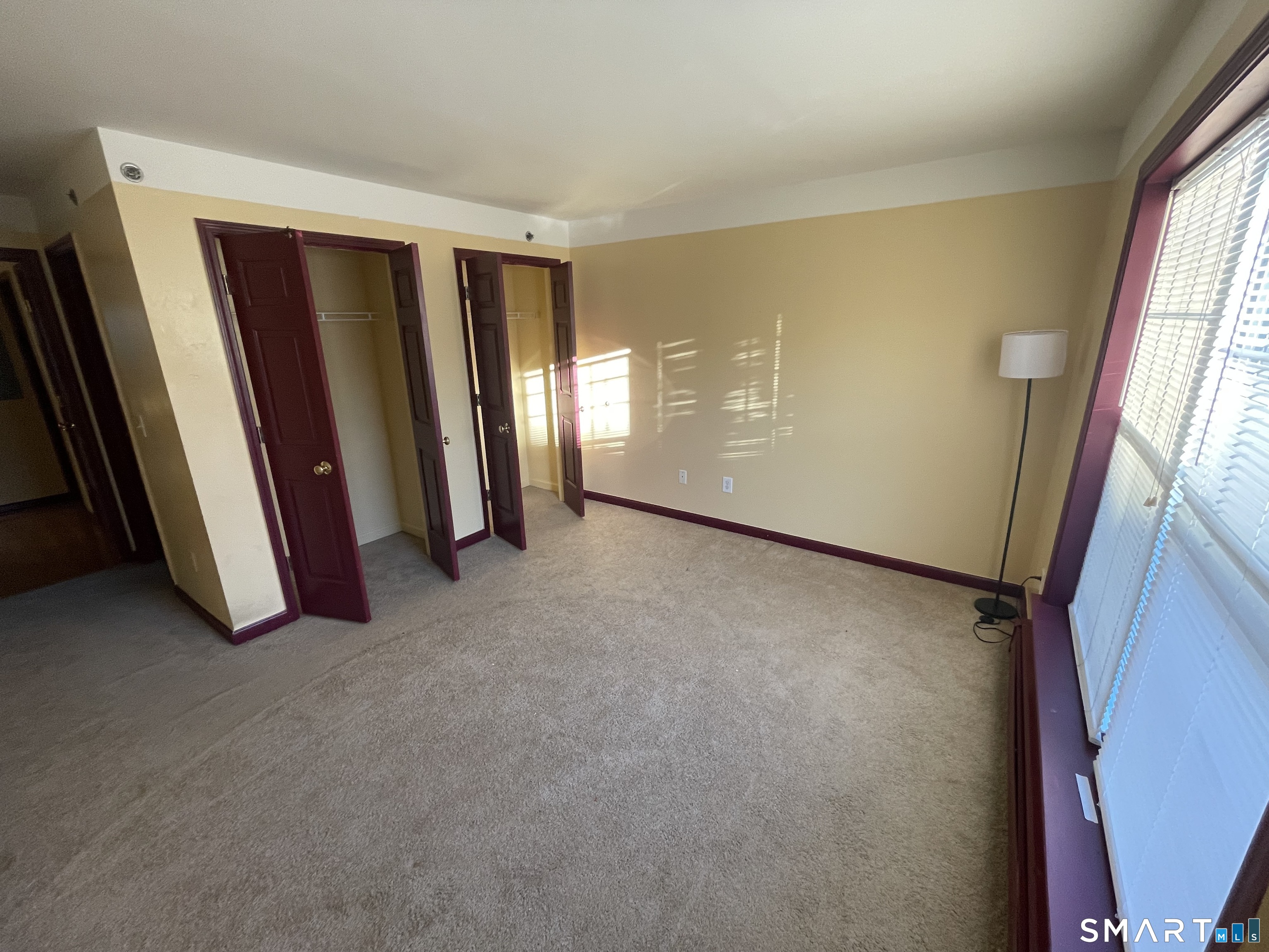 11 Button Street New Haven, CT 06519 - Photo 14 of 18 an empty room with windows
