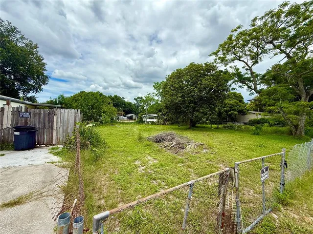 a view of a garden and basketball court