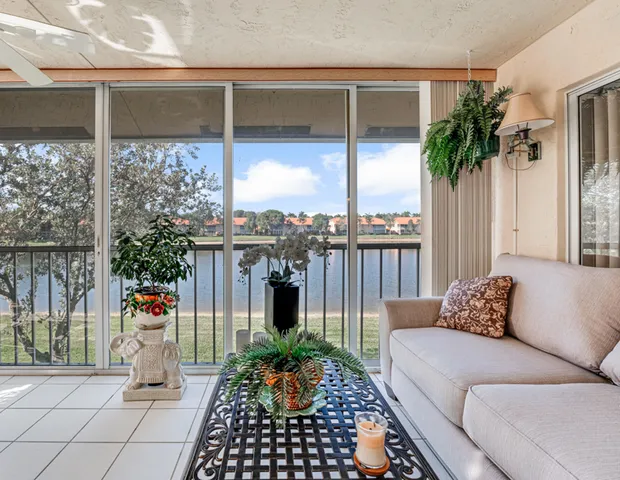 a front view of house with yard and trees
