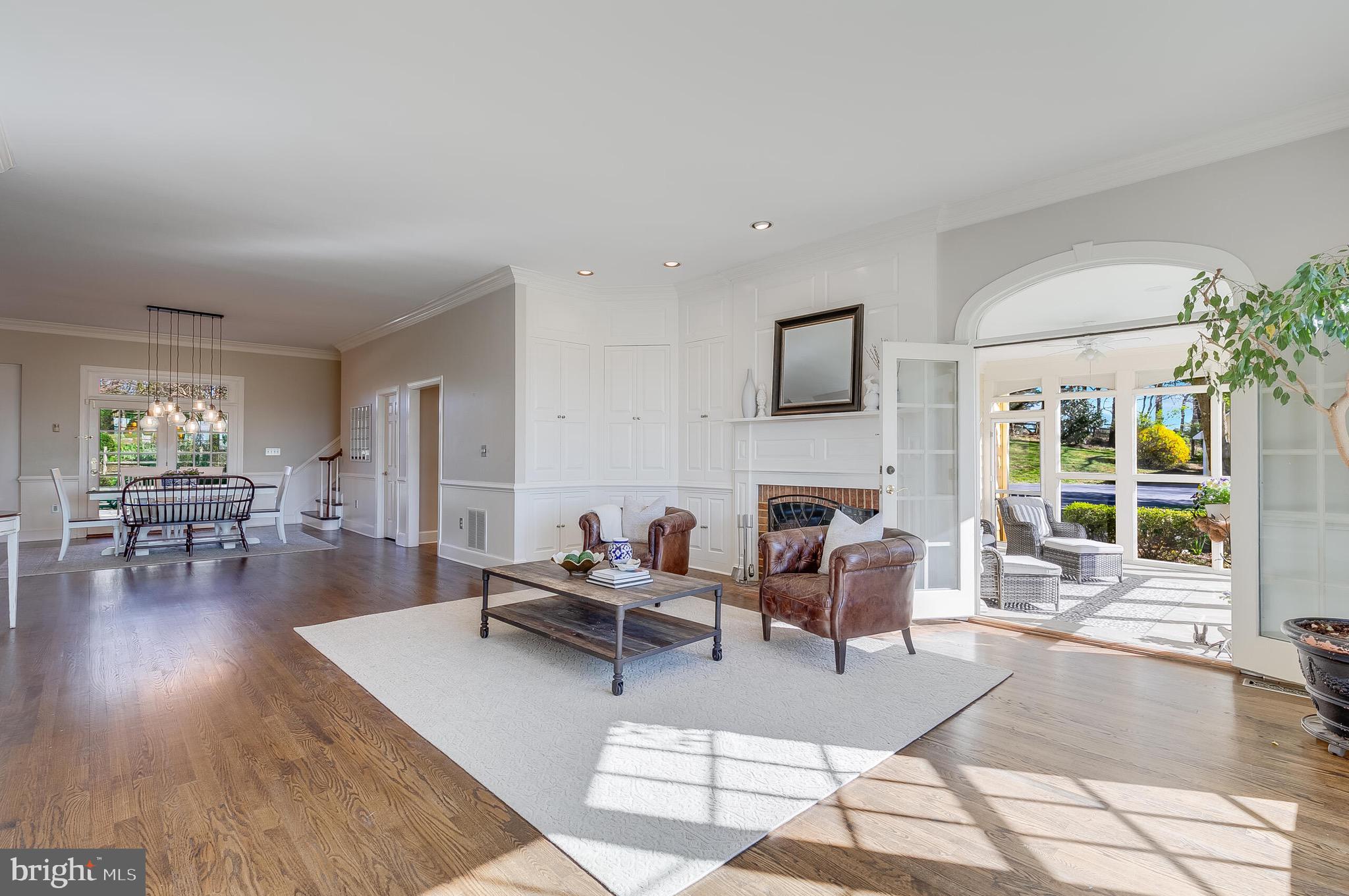 15140 Loyalty Road Waterford, VA 20197 - Photo 12 of 60 a living room with fireplace furniture and a potted plant