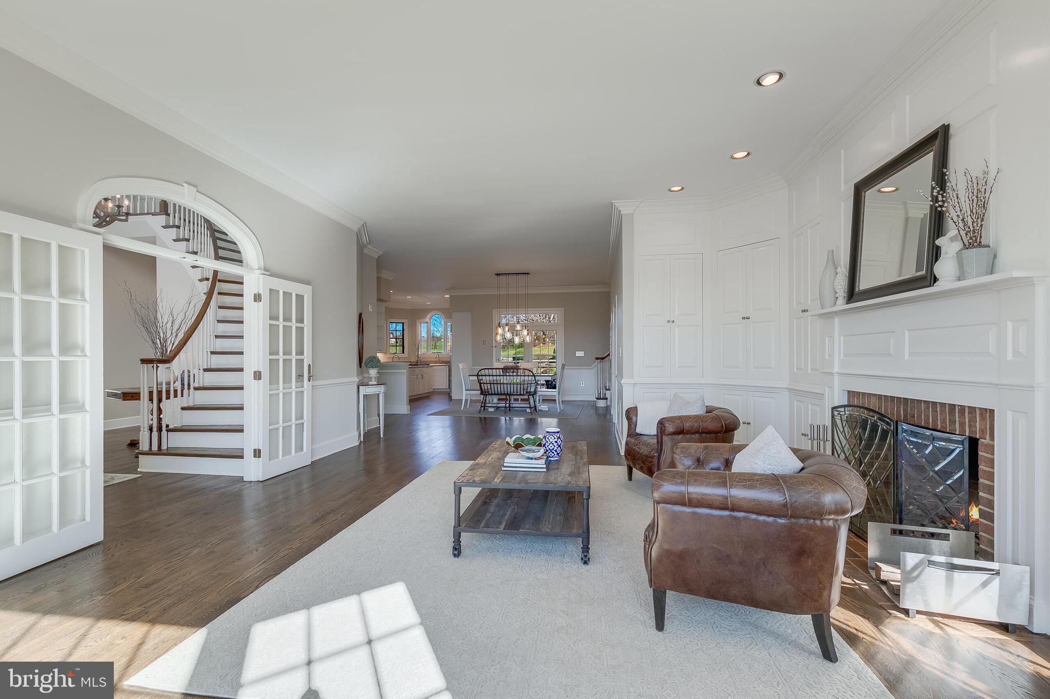15140 Loyalty Road Waterford, VA 20197 - Photo 13 of 60 a living room with furniture and a fireplace