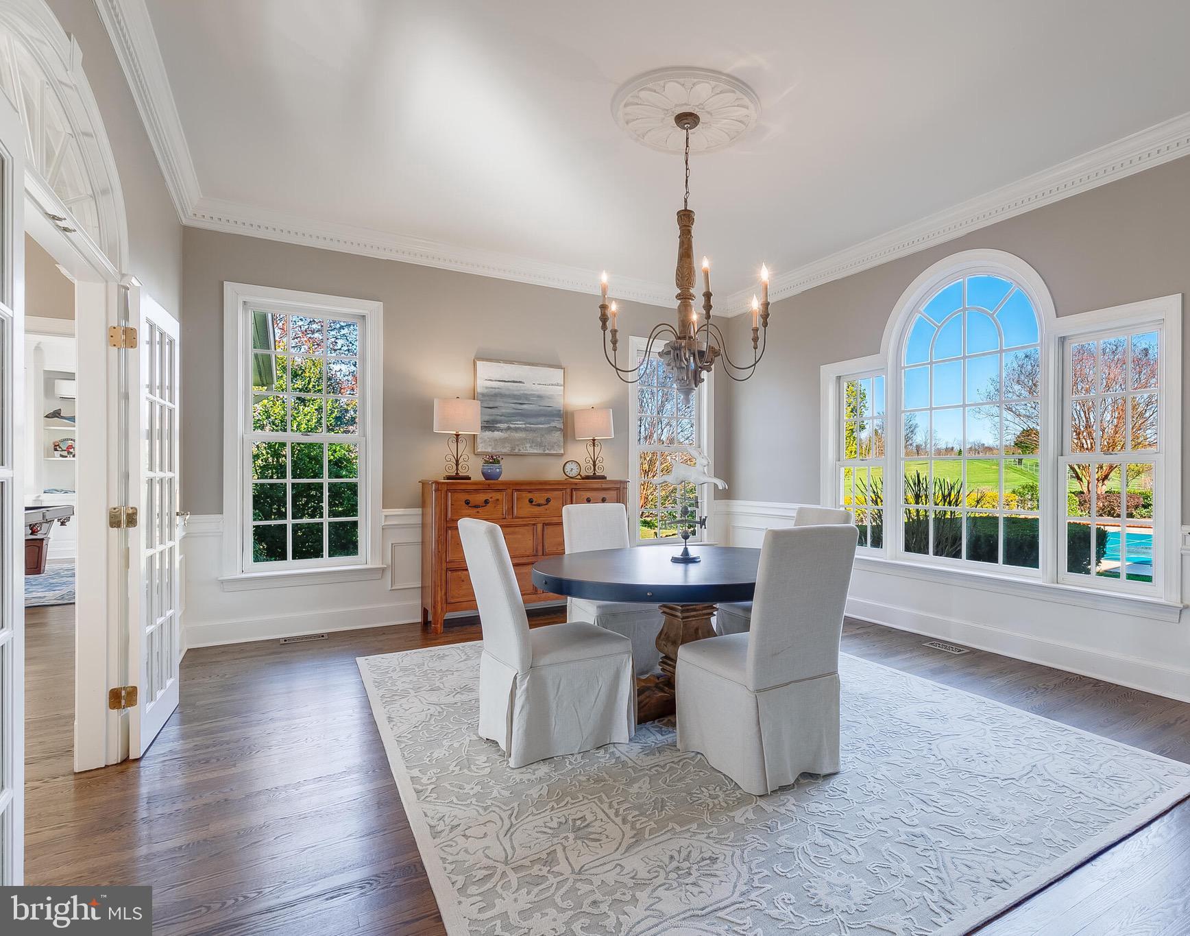 15140 Loyalty Road Waterford, VA 20197 - Photo 20 of 60 a view of a dining room with furniture window and wooden floor