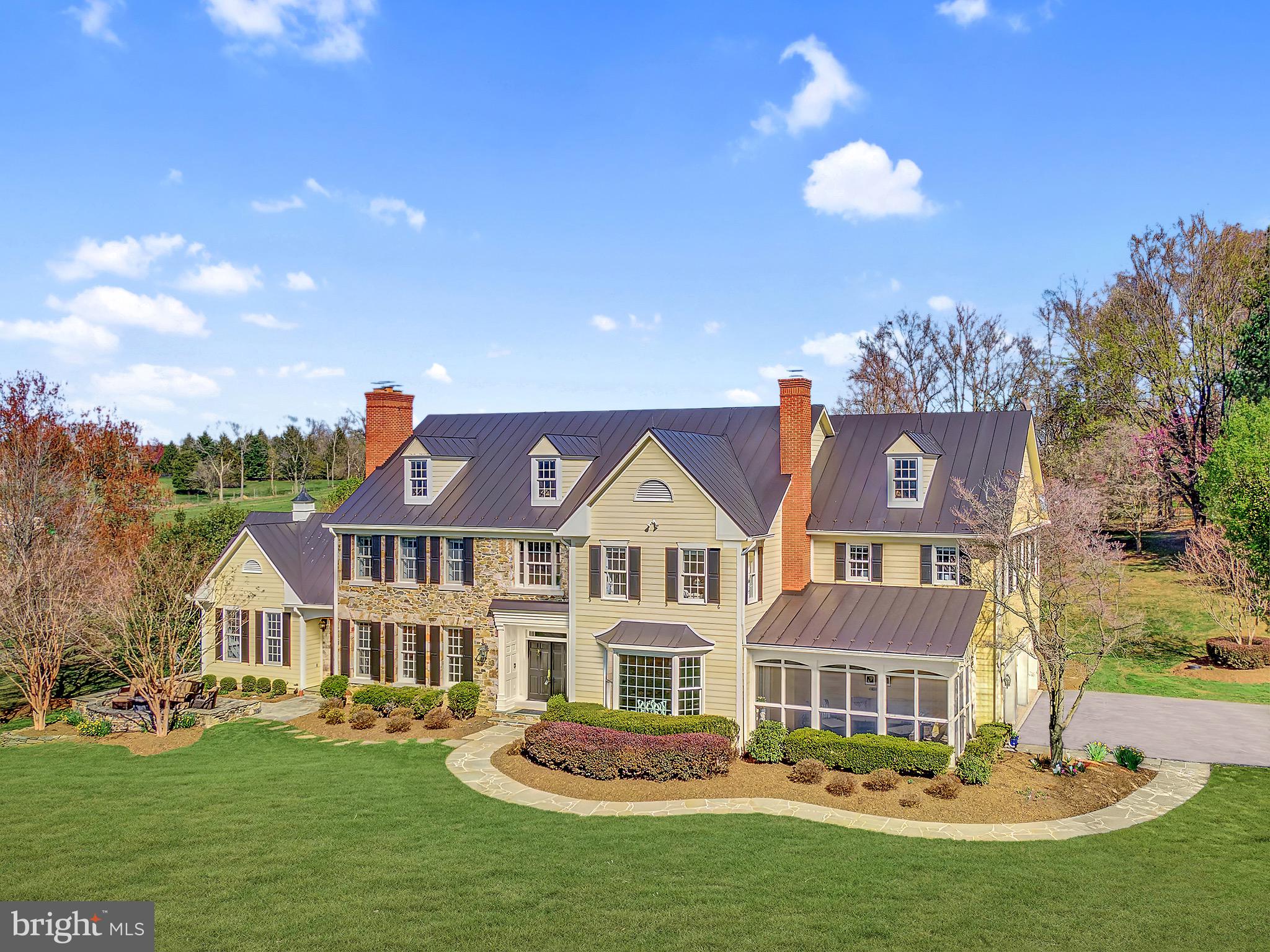 15140 Loyalty Road Waterford, VA 20197 - Photo 2 of 60 a front view of a house with garden