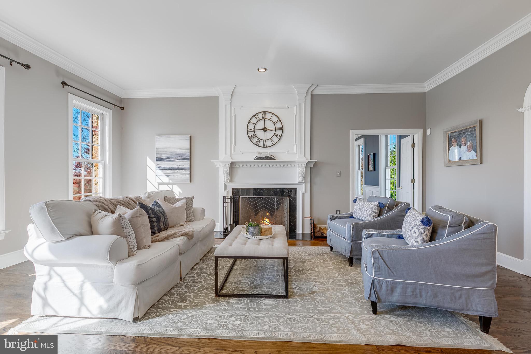 15140 Loyalty Road Waterford, VA 20197 - Photo 22 of 60 a living room with furniture and a fireplace