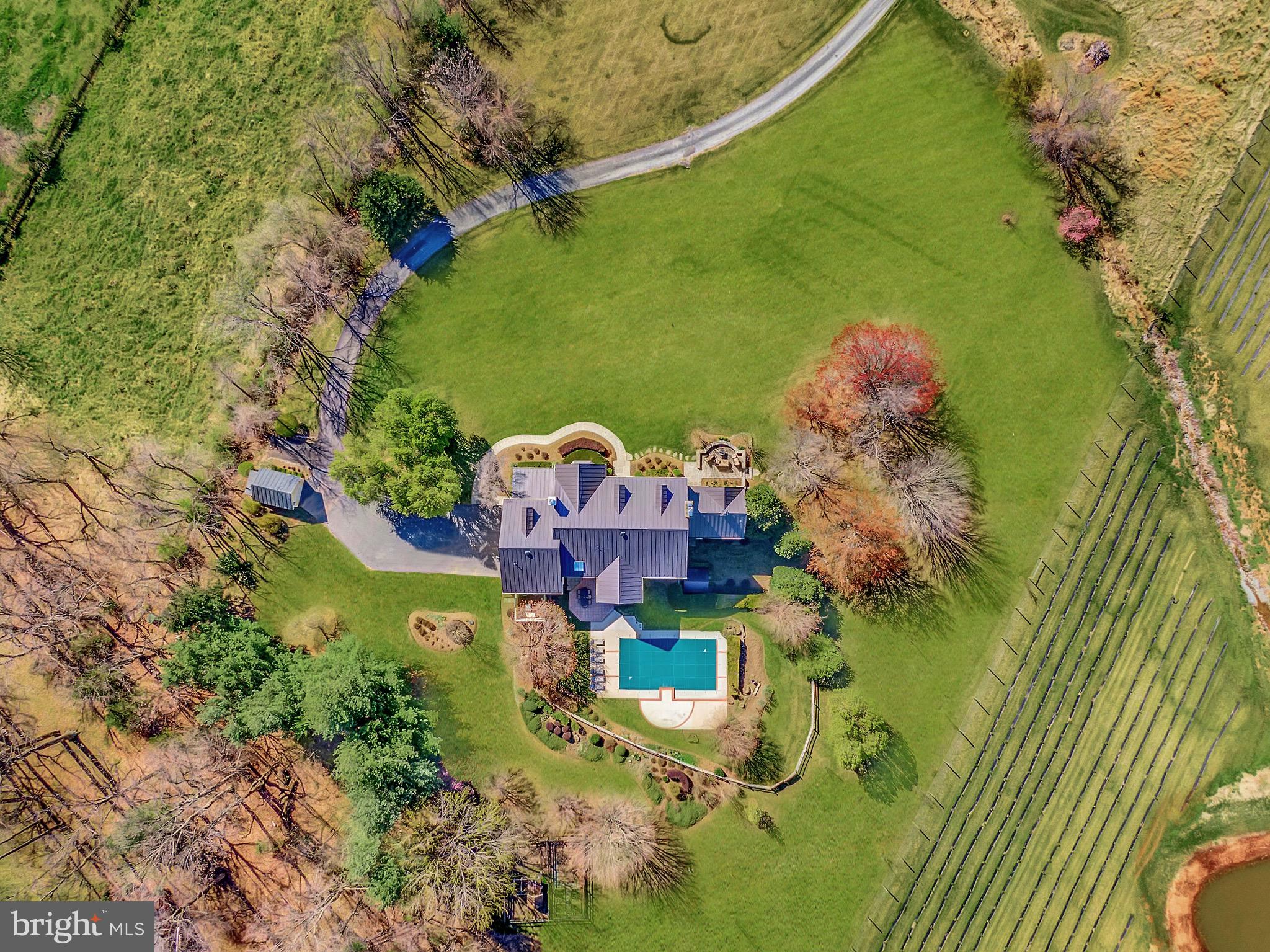 15140 Loyalty Road Waterford, VA 20197 - Photo 3 of 60 an aerial view of a house with a yard basket ball court