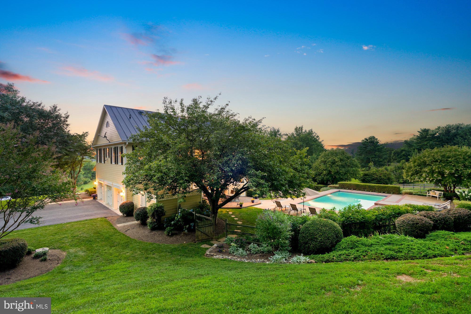 15140 Loyalty Road Waterford, VA 20197 - Photo 4 of 60 a view of an house with backyard space and garden