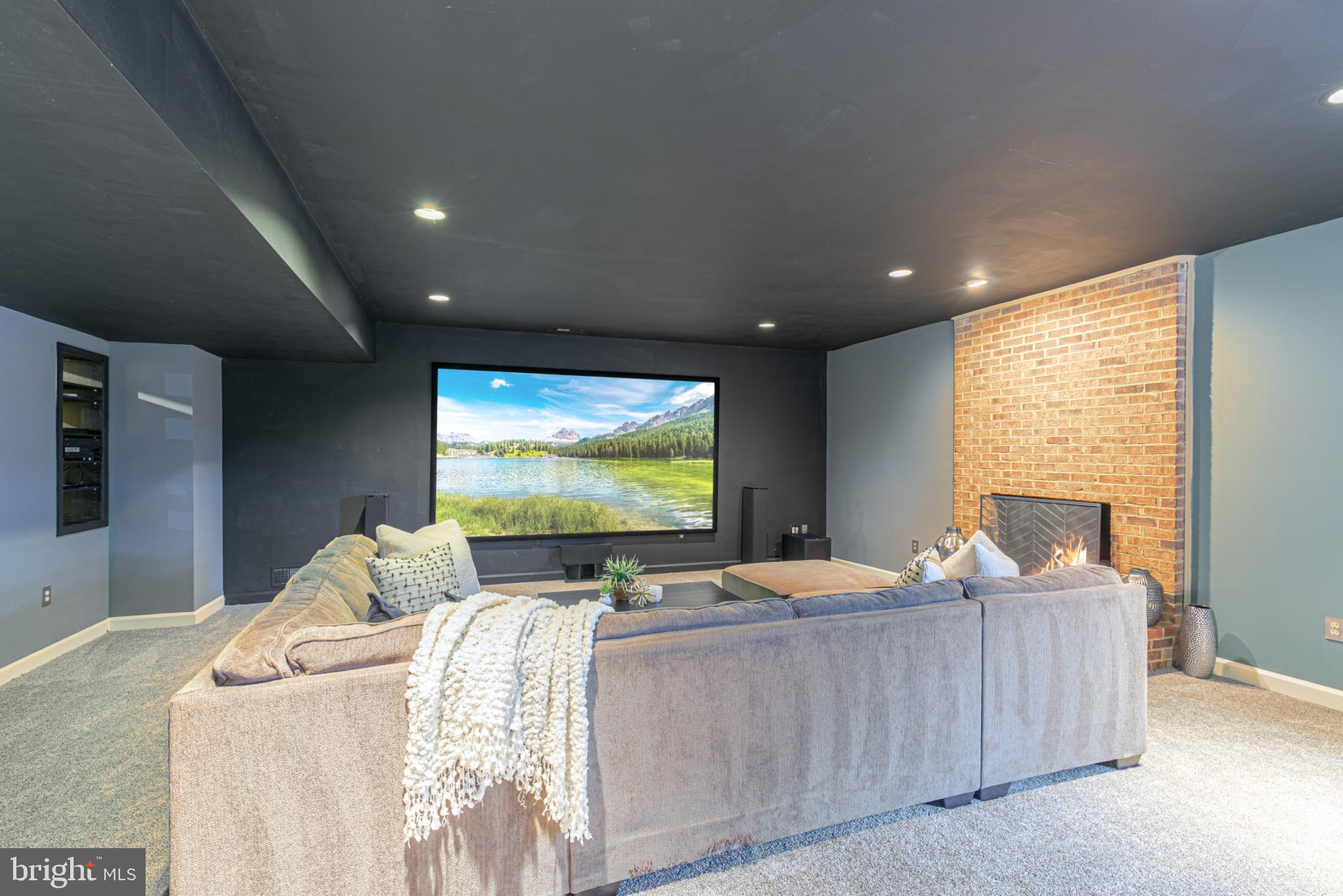 15140 Loyalty Road Waterford, VA 20197 - Photo 42 of 60 a room with furniture and a flat screen tv