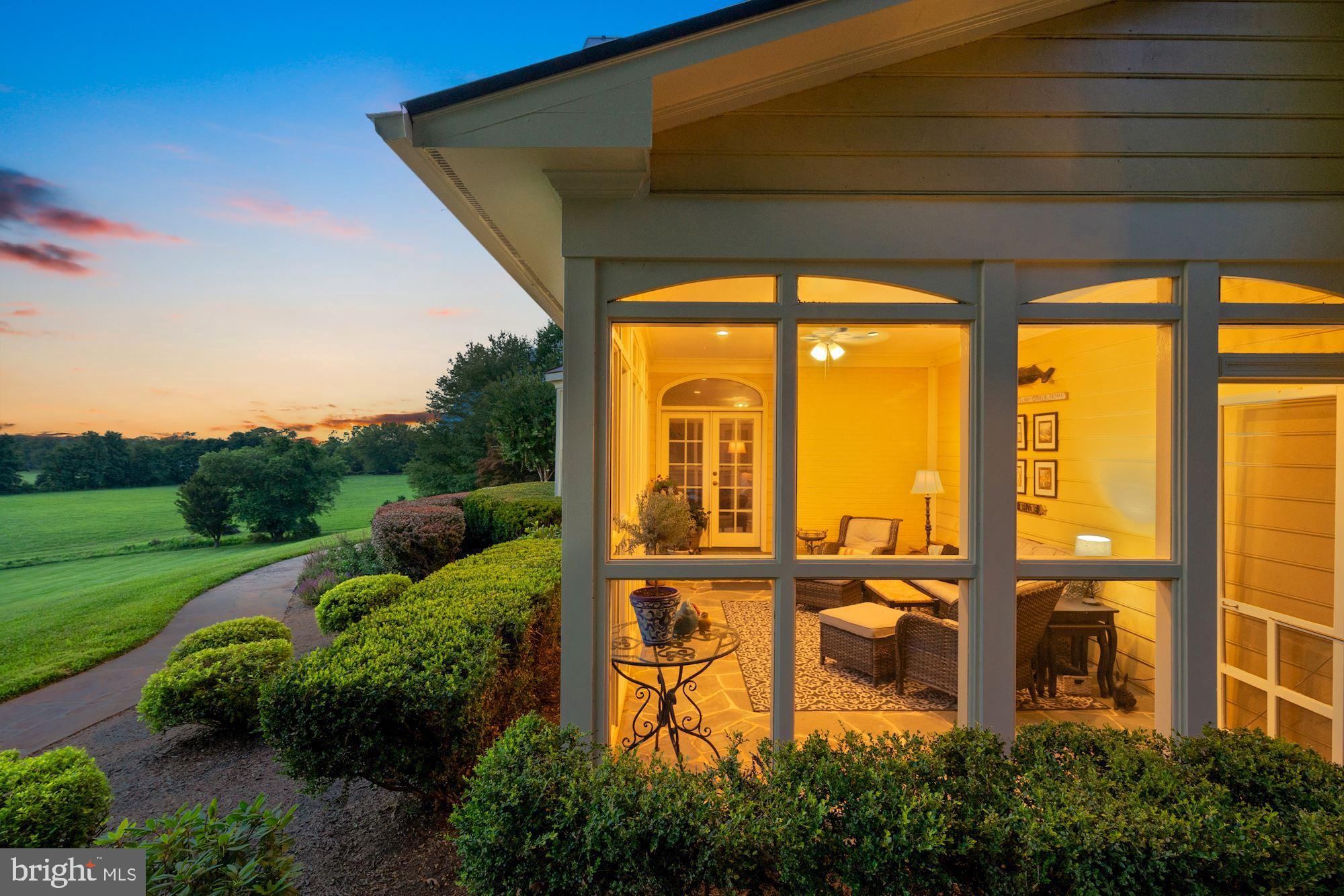 15140 Loyalty Road Waterford, VA 20197 - Photo 47 of 60 Screened in porch in the evening