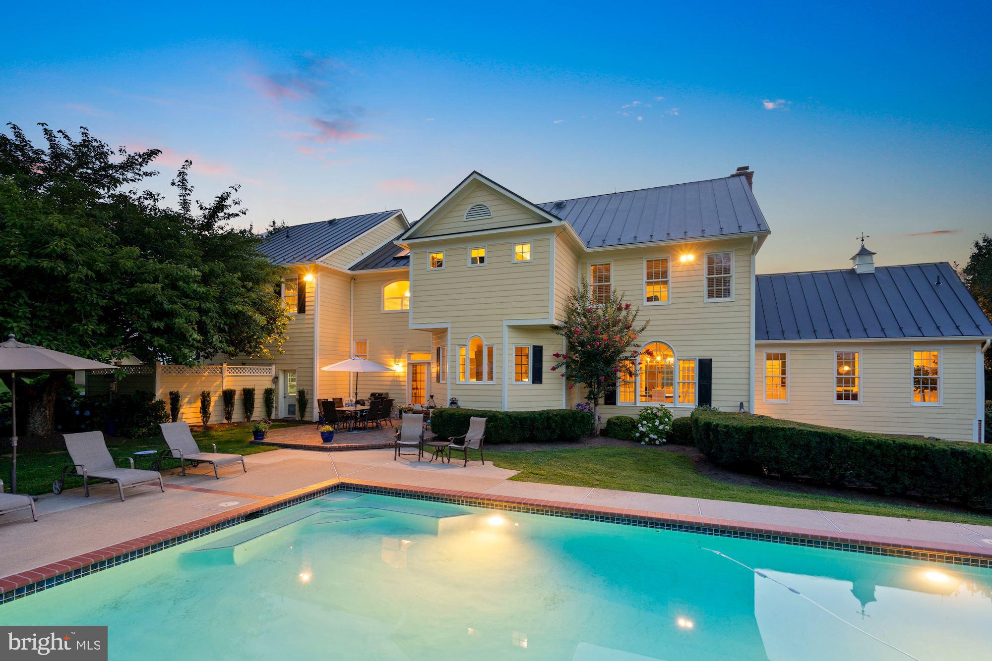 15140 Loyalty Road Waterford, VA 20197 - Photo 48 of 60 a view of a house with a swimming pool