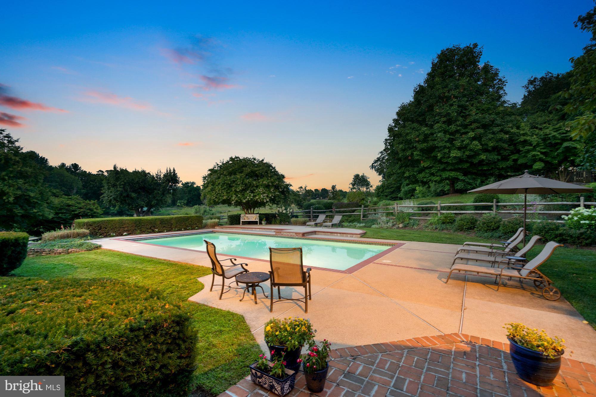 15140 Loyalty Road Waterford, VA 20197 - Photo 49 of 60 a view of a swimming pool with a patio